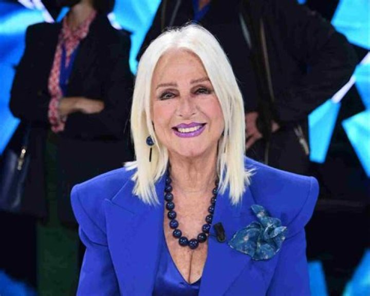 Loretta Goggi biografía, edad, altura, esposa, net worth, familia