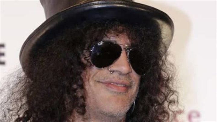 Slash Biography, Age, Height, Wife, Net Worth, Family
